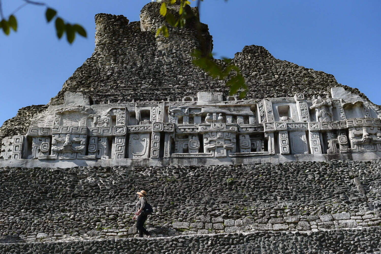 A frieze replicated artifact depicting gods and monsters. At the foot of “El Castillo,” name given to this mammoth of a structure, is where the ghost of the stone maiden, Xunantunich, was encountered by nearby villagers in early 1800.